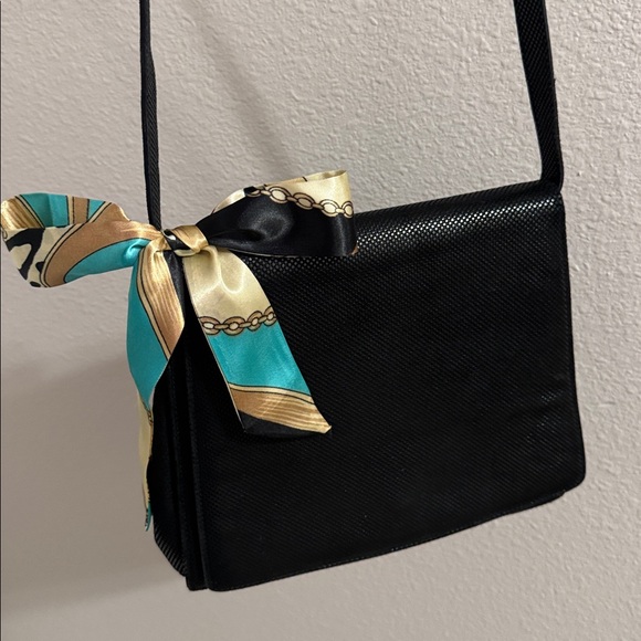 Ferragamo embossed stingray design black crossbody with COA